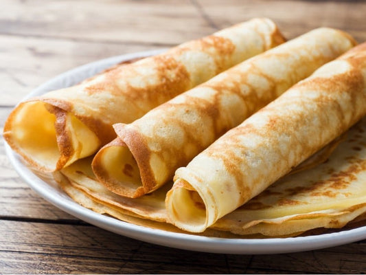 CHILDHOOD PANCAKES (thin pancakes with butter and shredded cheese)